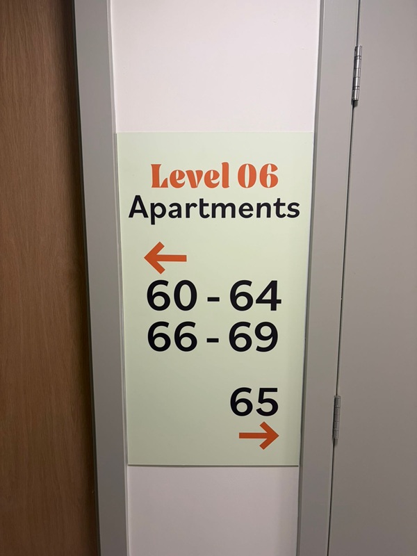 An image of the wayfinding signage for a different level in the apartment.